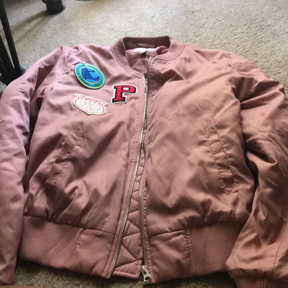 Pink bomber jacket with patches